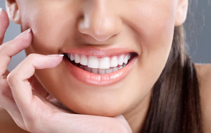 close up, beautiful young woman with big healthy smile for dental leads concept
