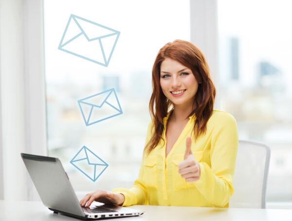 Young lady thumbsup after testing email message concept image. Testing the email marketing platform and email marketing tool is necessary to ensure positive results.