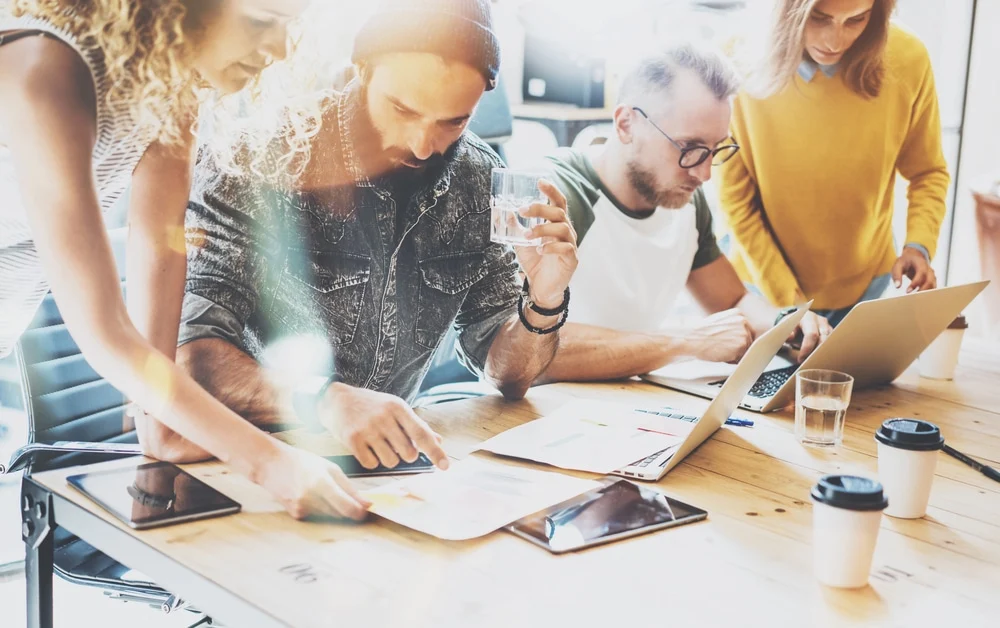 digital marketing team members working together