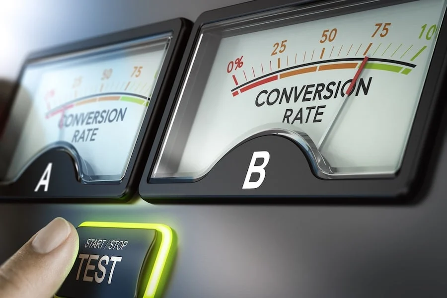 Finger-Touching-A-Button-Comparing-Two-Options-For-An-Ab-Test-For-Conversion-Rate comparing two types of ppc ads for a/b testing.
