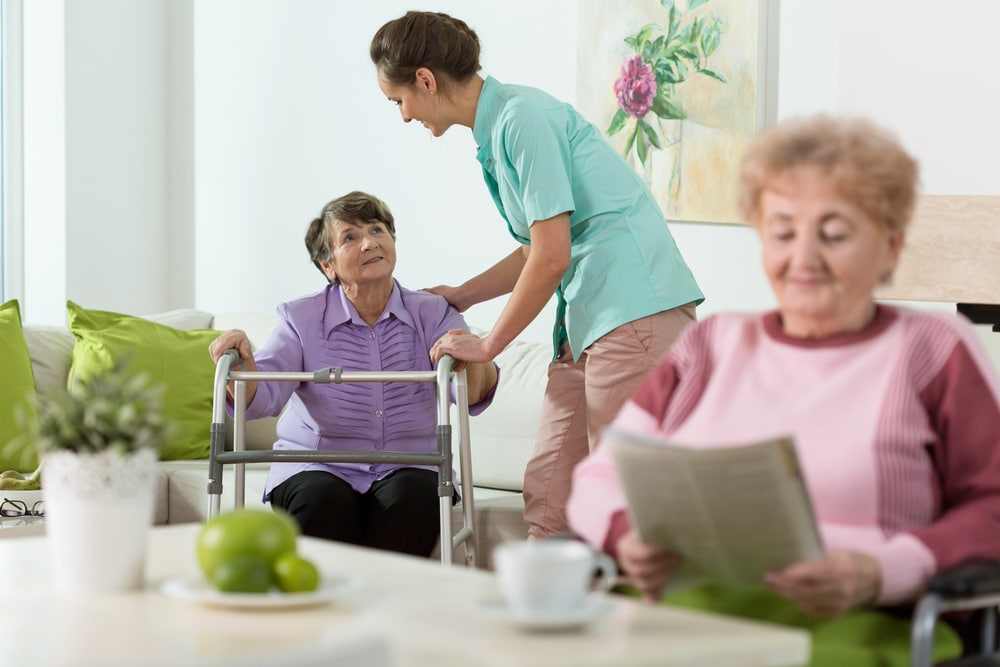 happy old patients at their trusted assisted living facility