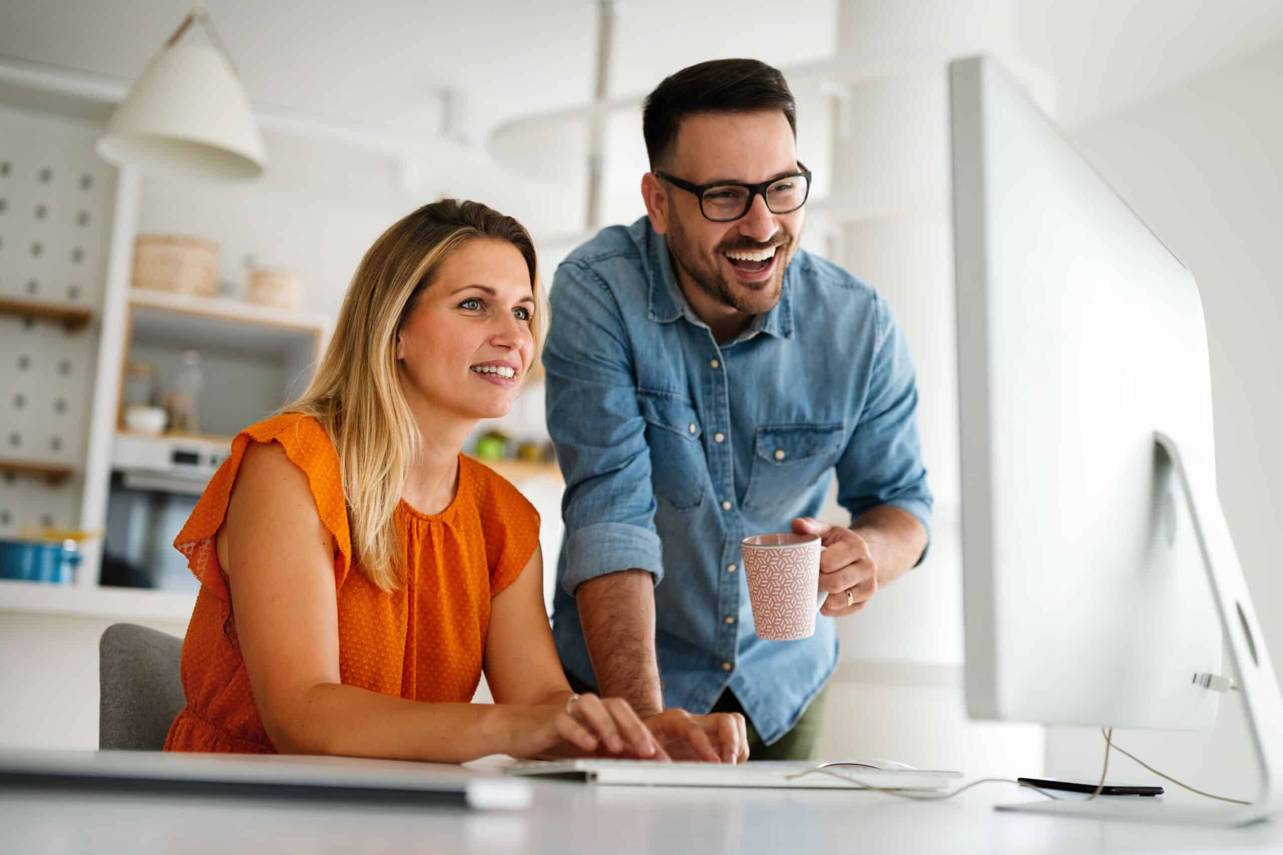 male and female team members working on a multi-location SEO project