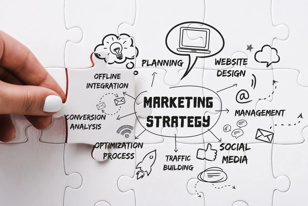 Puzzle-Pieces-Displaying-Components-Of-A-Digital-Marketing-Strategy puzzle pieces displaying components of a digital marketing strategy