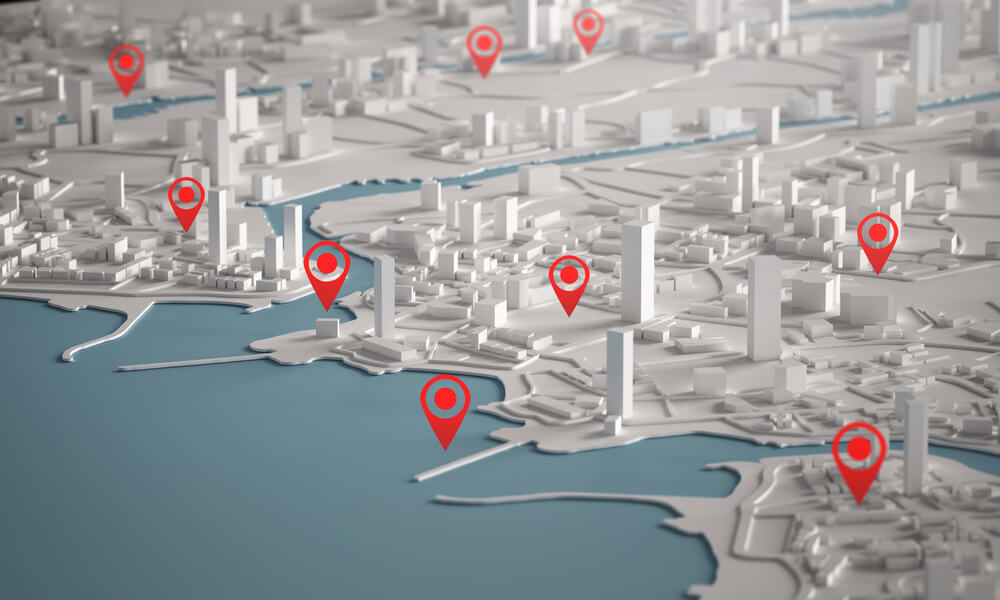 red map pins on a city layout to showcase a business with multiple locations