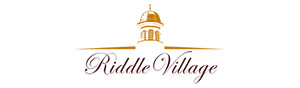 riddle village logo