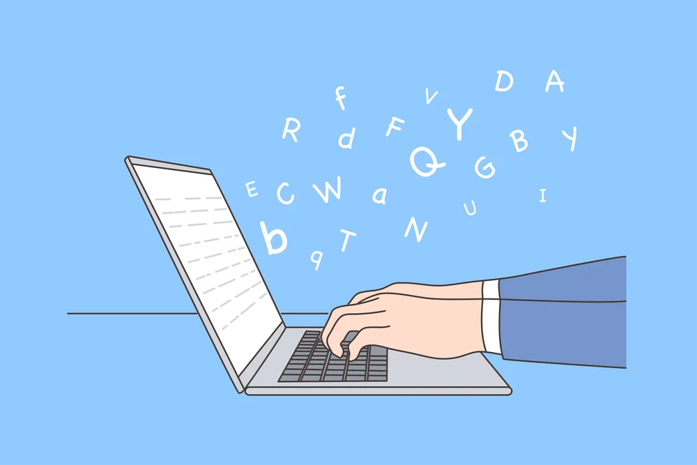 business person typing content on keyboard