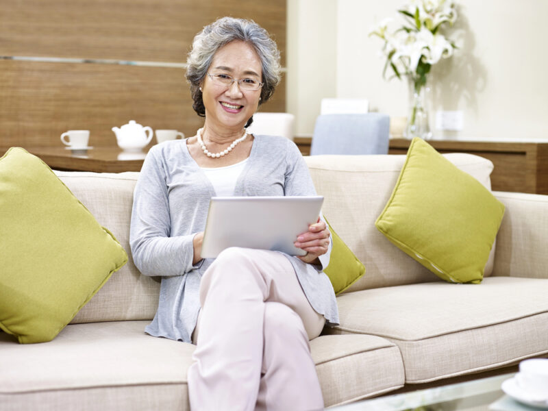 woman accessing mobile version of a website on a tablet